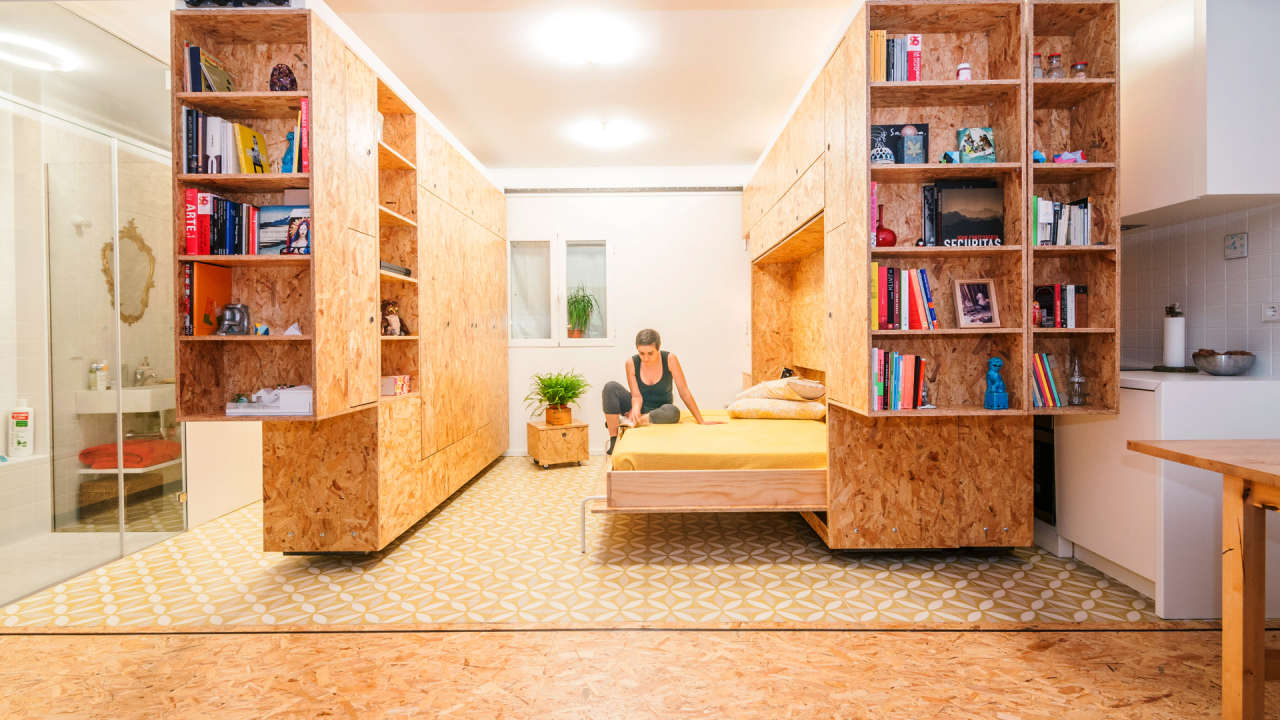 Moving Shelves Enable “Infinite Homes” Within A Tiny Studio