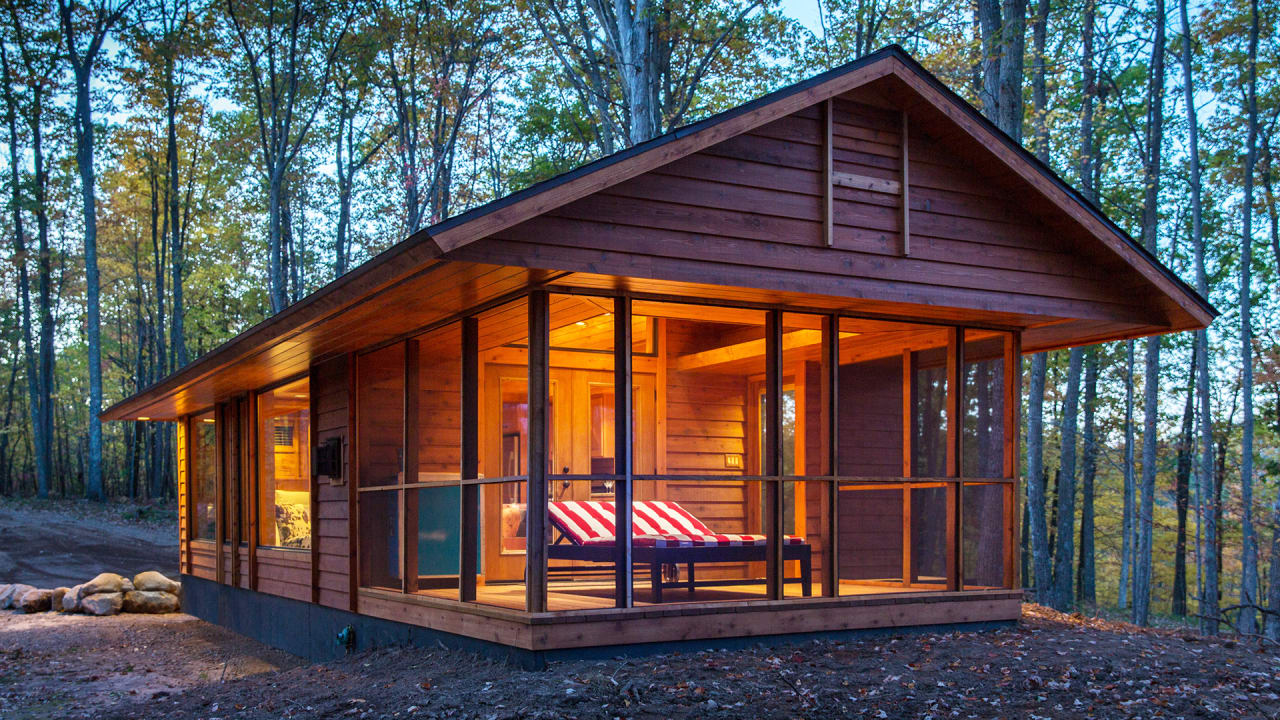 this adorable cabin has a secret–it’s actually an rv