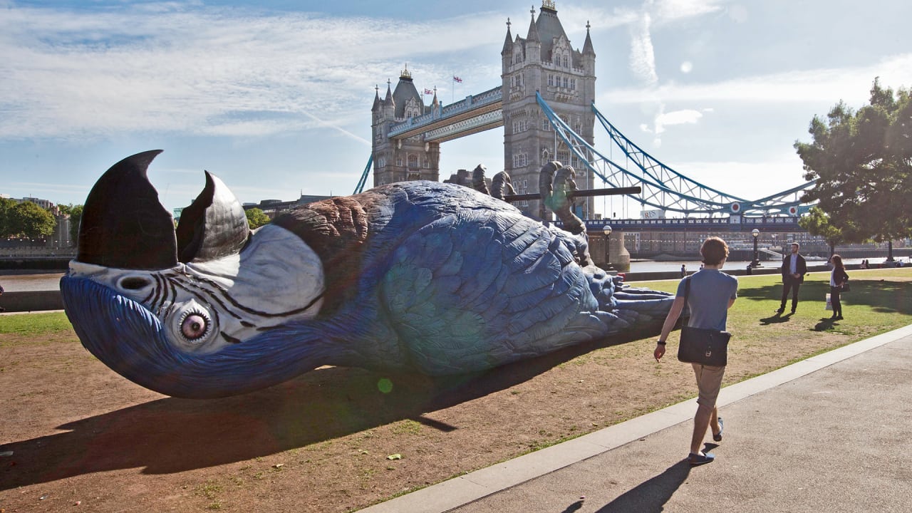 3033103-poster-p-1-london-celebrates-the-monty-python-reunion-by-putting-a-50-foot-dead-parrot-in-potters-field.jpg