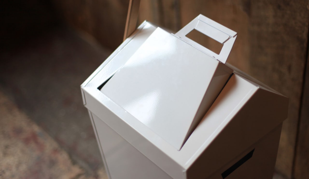 Simple Genius A Trash Can With A BuiltIn Dustpan And Brush Where